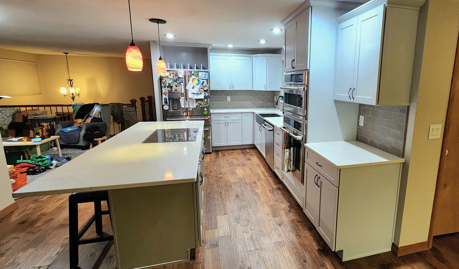 Kitchen after white cabinet refinishing