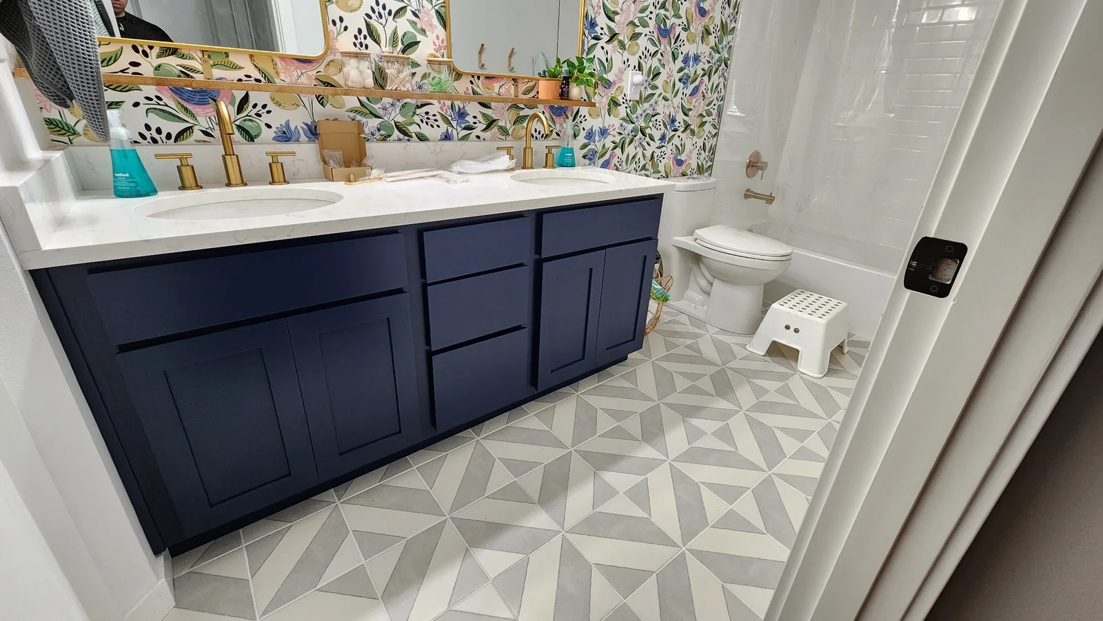 Navy blue refinished bathroom vanity