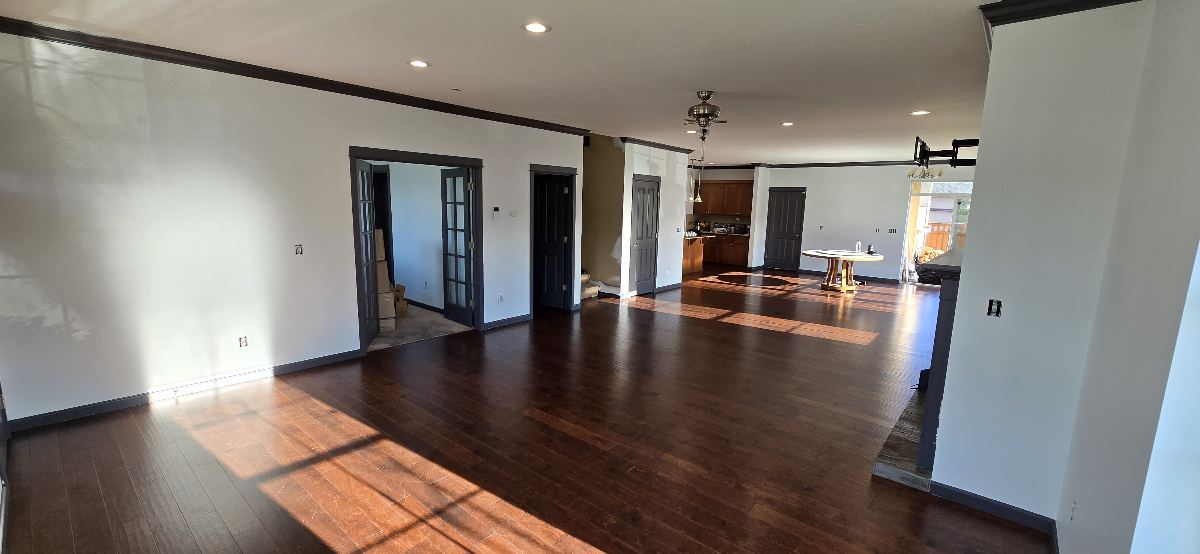 Painted walls and trim across connected rooms