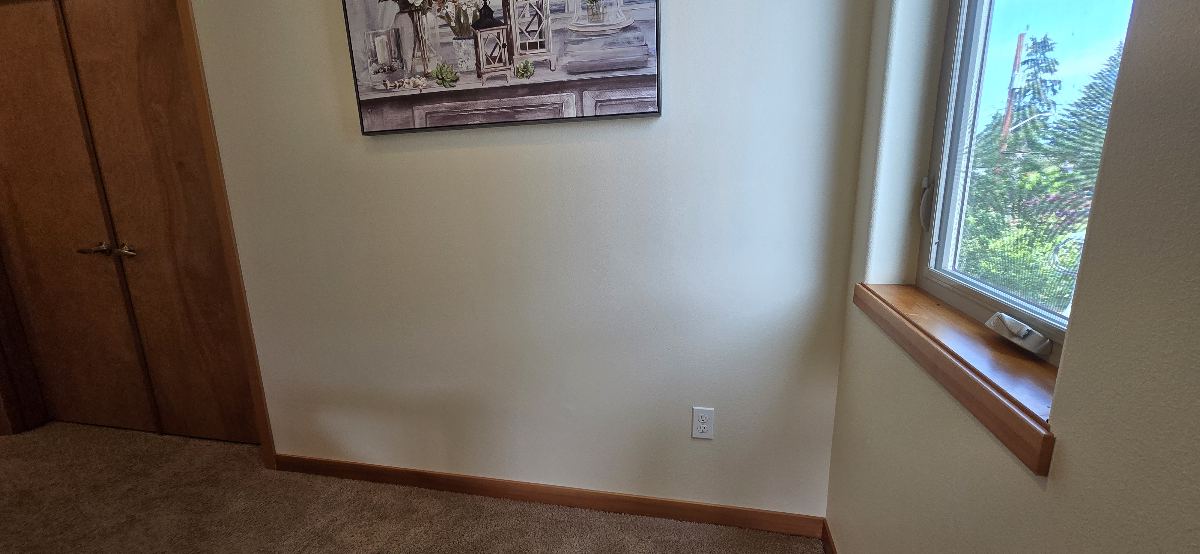 Finished wall after drywall repair and painting