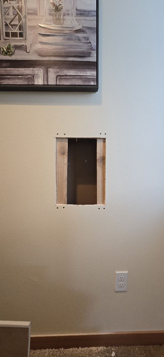 Wall opened during the drywall repair process