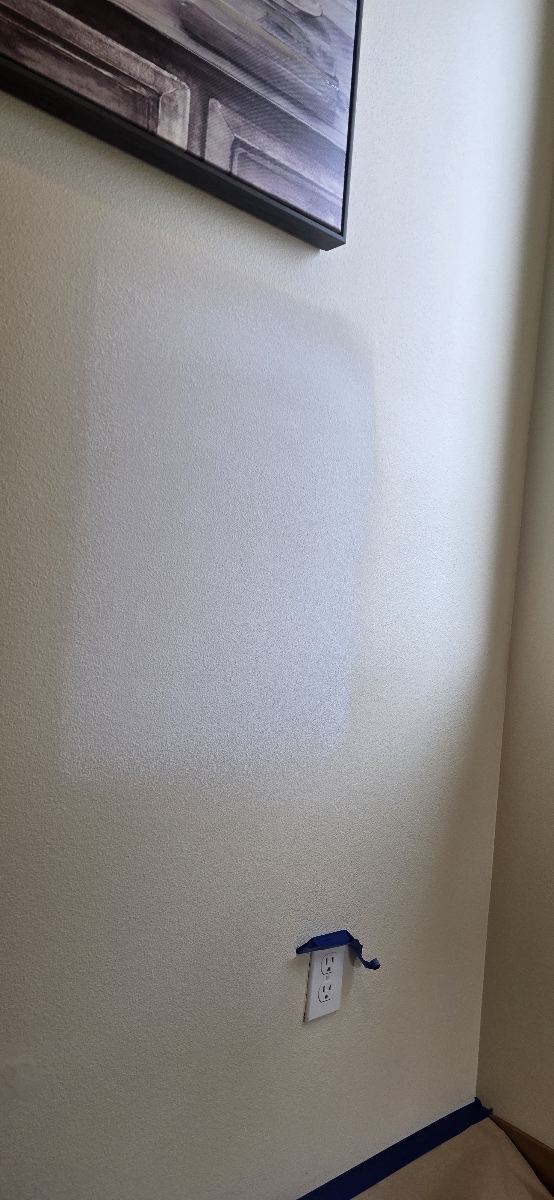 Repaired wall surface during priming