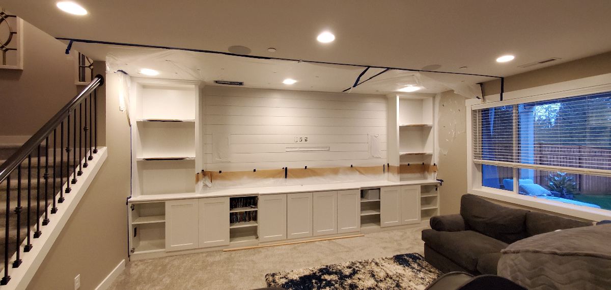 Painted media cabinetry with work still in progress