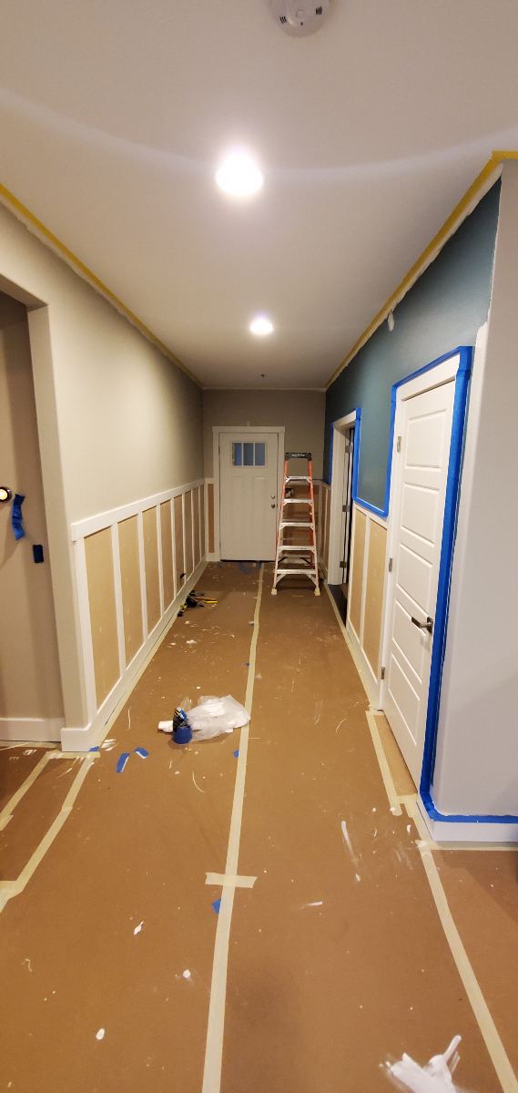 Hallway wainscoting and trim during preparation